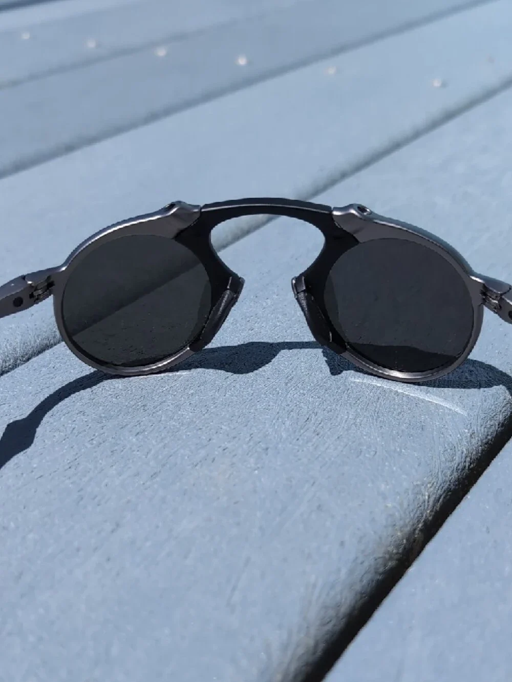 Oakley Madman Round Metal Black Silver Sunglasses with Polarized Mirrored Lenses